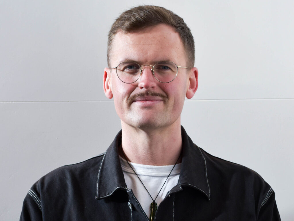 Portrait of Tom Roud.
